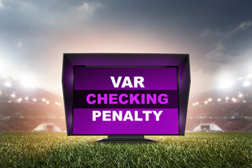 technology var checking penalty.The video assistant referee scene a match official in football stadium.  - obrazy, fototapety, plakaty