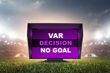 technology var decision no goal.The video assistant referee scene a match official in football stadium. 