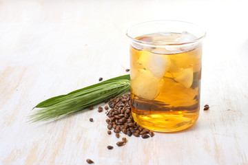 iced barley tea in a glass. caffeine free alternative healthy drink