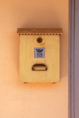 Mailbox on the wall of a house