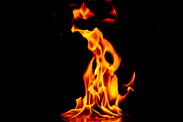 Fototapeta premium Fire flames on black background