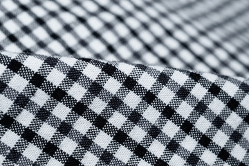 Black and white checkered fabric close up. squared pattern. geometric background