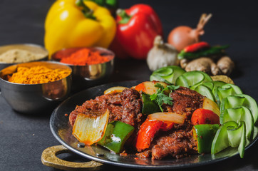 Tawa Fish an Indian origin fish fry or grilled cooked and decorated with bell pepper and capsicum