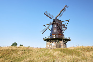 Old wind mill on the countryside of Hoganas in south Sweden.