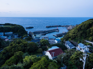 Fototapeta na wymiar View of Ashizuri fishing harbor before sunrise - Cape Ashizuri, Japan