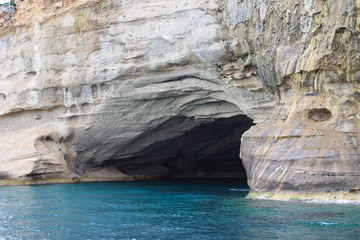 white grotto view from the turquoise sea