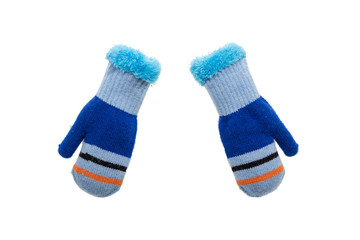 Pair of knitted blue children gloves isolated on white background