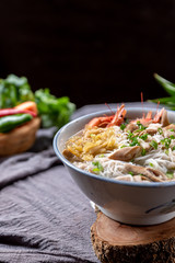 Rice noodle soup with many delicious ingredients
