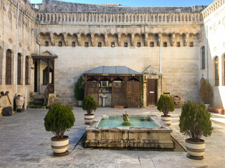 Sanliurfa/Turkey- February 01 2020: View of Kitchen Museum in Sanliurfa. There is Fountain Pool at...