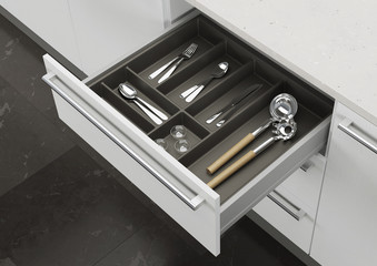 Open kitchen drawer with cooking utensils. Storage and organization of the kitchen. 3d rendering.