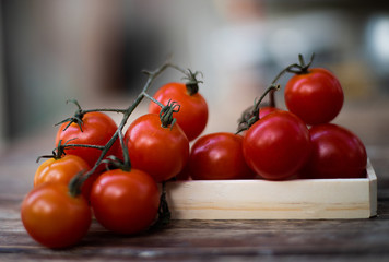 fresh tomatoes  on wood table.