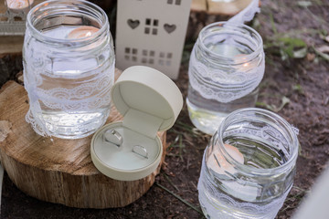 gold wedding rings in a round box