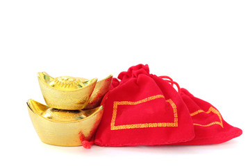 Ancient Chinese golden ingots and Chinese lucky red bags on white background, Chinese new year ornament