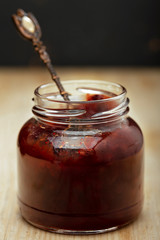 Jar of jam closeup. Red jam
