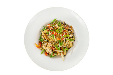 Pasta, noodles with chicken, Pad Thai, decorated with vegetables, bell pepper, chives, sesame...