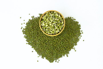 sprout mung beans in bowl and on mung beans heart shape background