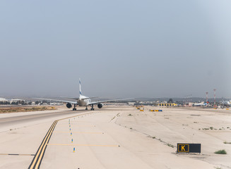 The plane of the Israeli airline El Al is moving on the runway of Ben Gurion International Airport, near Tel Aviv in Israel