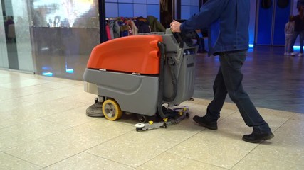 job Professional floor washer at the supermarket