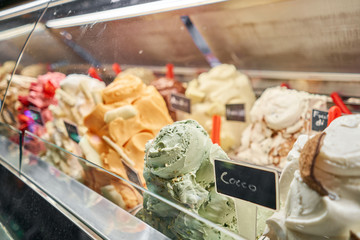 Pistachio Gelato. Flavors various ice cream in Rome, Italy. Italian gelateria. Assortment of colorful gelato on cafe showcase. Natural fresh ice cream.