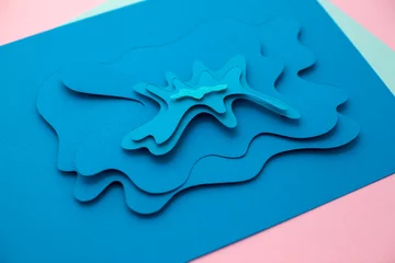 Deurstickers Kristal Handgemaakte abstracte papierkunst en gesneden golf in blauwe kleur.