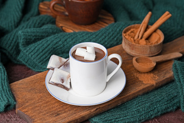 Cup of hot chocolate on table