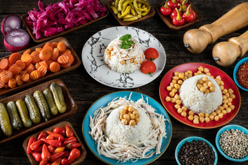 Turkish traditional street food chicken and rice with chickpeas. Tavuklu pilav with ayran concept.