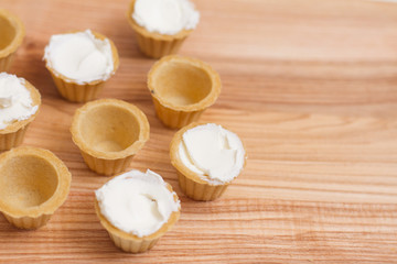 Tartlets with custard or cottage cheese.