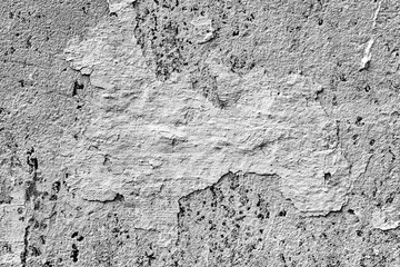 Texture of a concrete wall with cracks and scratches which can be used as a background