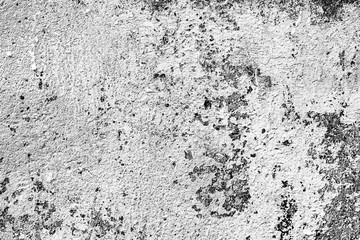 Texture of a concrete wall with cracks and scratches which can be used as a background