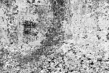 Texture of a concrete wall with cracks and scratches which can be used as a background