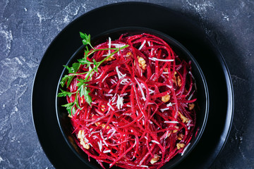 Low fat red beetroot salad of walnuts, close-up