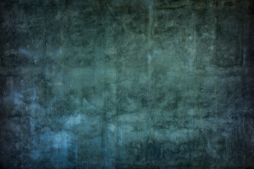 Grunge dark aged wall plaster texture background.