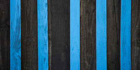 Blue and black wooden wall striped background of wood texture plank
