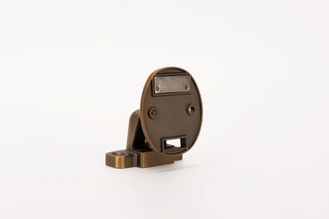 Various metal door stop tools on white background