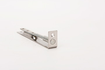 The simple silver metal deadbolt against a white background