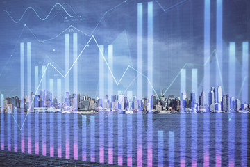 Forex graph on city view with skyscrapers background double exposure. Financial analysis concept.