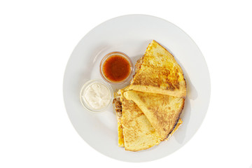 Quesadilla with minced meat and cheese, 3 slices, two sauces from tomatoes and sour cream, isolated white background, view from above
