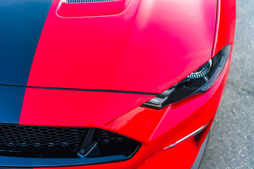 Close up photo of modern car, detail of headlight. Headlight car Projector LED of a modern luxury...