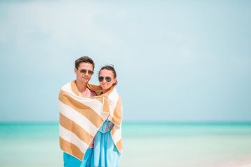 Young happy couple during tropical beach vacation