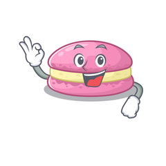 A funny picture of strawberry macarons making an Okay gesture