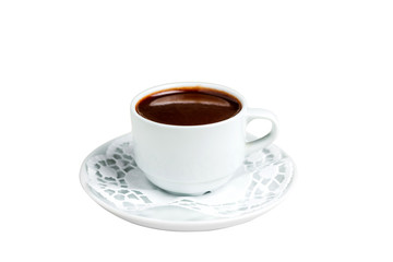 A small white cup of dark hot chocolate on a white saucer and a napkin