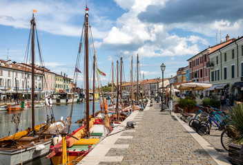 The port canal designed by Leonardo da Vinci and old town of Cesenatico on the Adriatic sea coast - obrazy, fototapety, plakaty