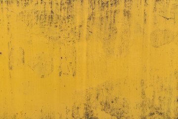 Abstract yellow cement wall