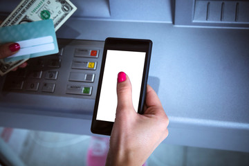 Fototapeta premium Woman using modern ATM nashine - cash withdrawal.