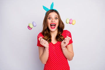 Excited crazy girl hold stick eggs she get easter hunt collect impressed shout wear retro stylish...