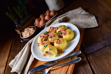 Polish dumplings with meat and mushroom sauerkraut filling
