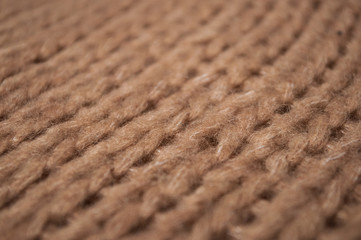 Closeup of brown woolen pullover texture