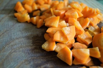 finely cut orange triangles for carrot soup kitchen Board