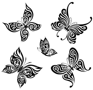 Vector background with the image set of black and white butterflies in the form of a tribal tattoo 
