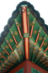 Korean traditional colourful painting style of the palace roof at an edge. Heritage and indigenous painting.